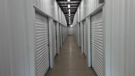 Hallway with storage units.