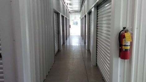 Hallway with storage units.