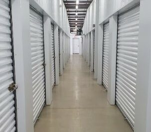 Hallway with storage units.