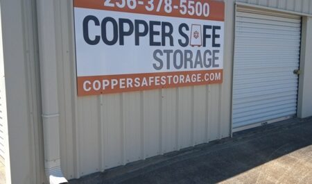 Copper Safe Storage sign on building.