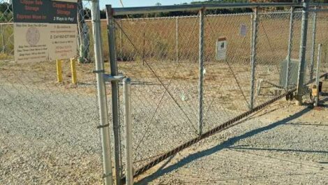 Closed security gate at Copper Self Storage in Ripley.