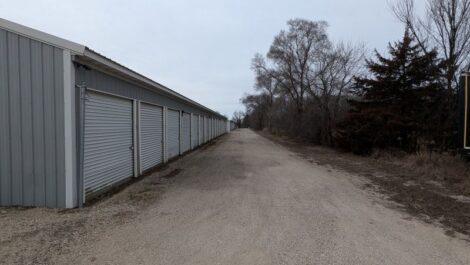 Gravel road to drive up storage units.