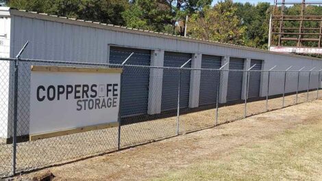 Sign on fence with Coppersafe Storage at Copper Safe Storage in Star City 1006