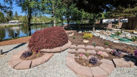 View of pond and garden at Uncle John's RV Park and Self-Storage facility.