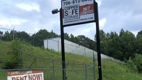 Tall Copper Safe Storage sign.