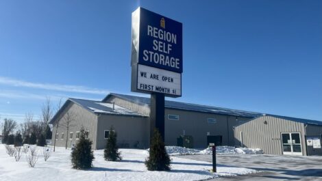 Region Self Storage sign in the winter.