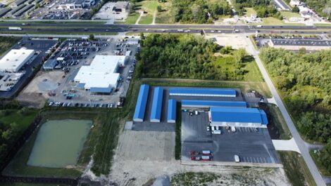 Aerial view of Copper Safe Storage with blue roofs.