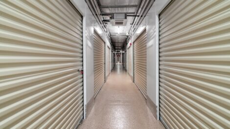 Hallway view of indoor storage units.