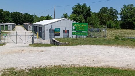 Muddy Man Storage facility with fencing.