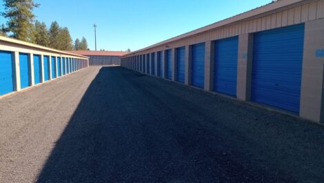 Aisle of drive-up storage units at Discount Mini Storage.