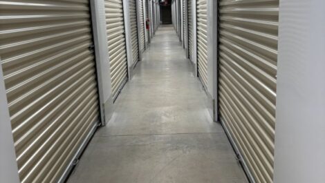 Hallway of indoor storage units at 803 Storage facility.